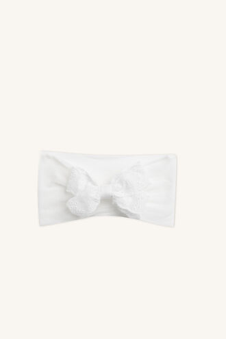 LACE BOW BABY HEADBAND in colour WHITE ALYSSUM