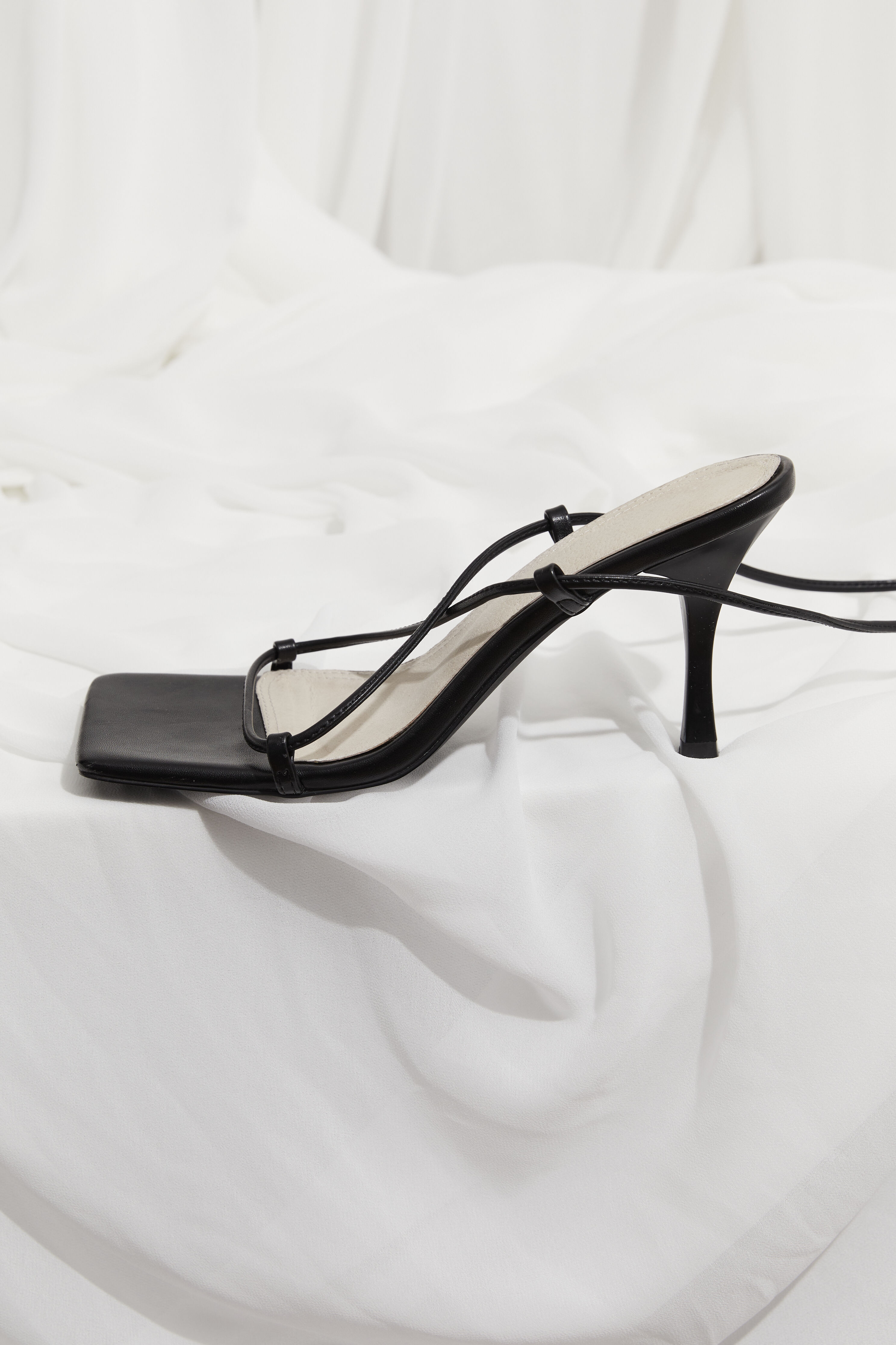 Black Strappy Heel In Black Bardot